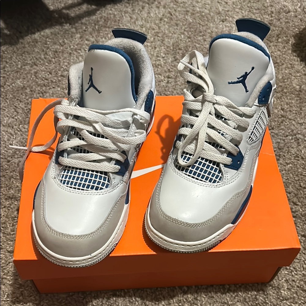 Nike White and Blue Sneakers with Classic Design